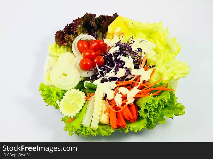 Mix vegetable salad on plate. Mix vegetable salad on plate