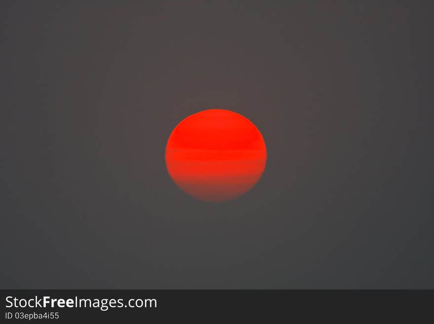 Red-orange sun in the evening