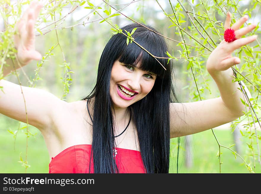 Single beautiful young woman relaxing at the park. Single beautiful young woman relaxing at the park