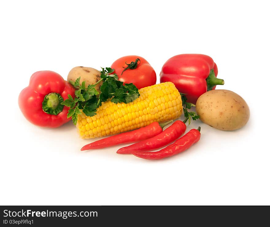 Tomato; potato; corn, pepper isolated on a white background. Tomato; potato; corn, pepper isolated on a white background