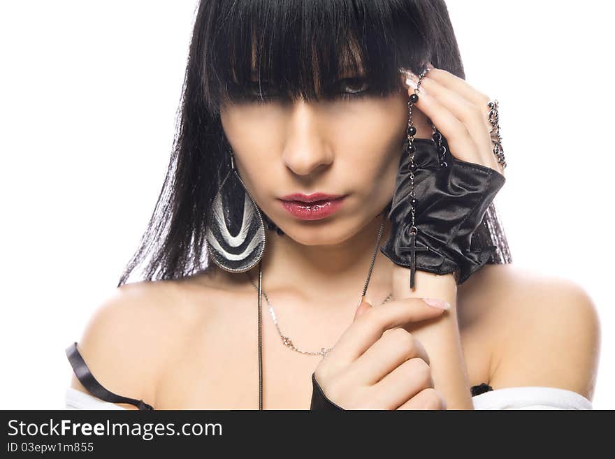 Close-up portrait of a young beautiful brunette girl with long hair and long nails. Close-up portrait of a young beautiful brunette girl with long hair and long nails.