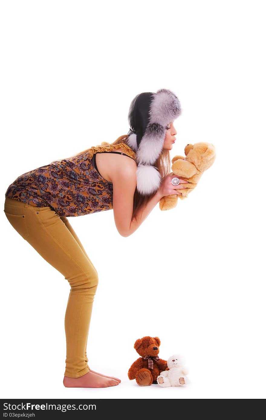 Beautiful longhair girl is holding the teddy bear. Beautiful longhair girl is holding the teddy bear