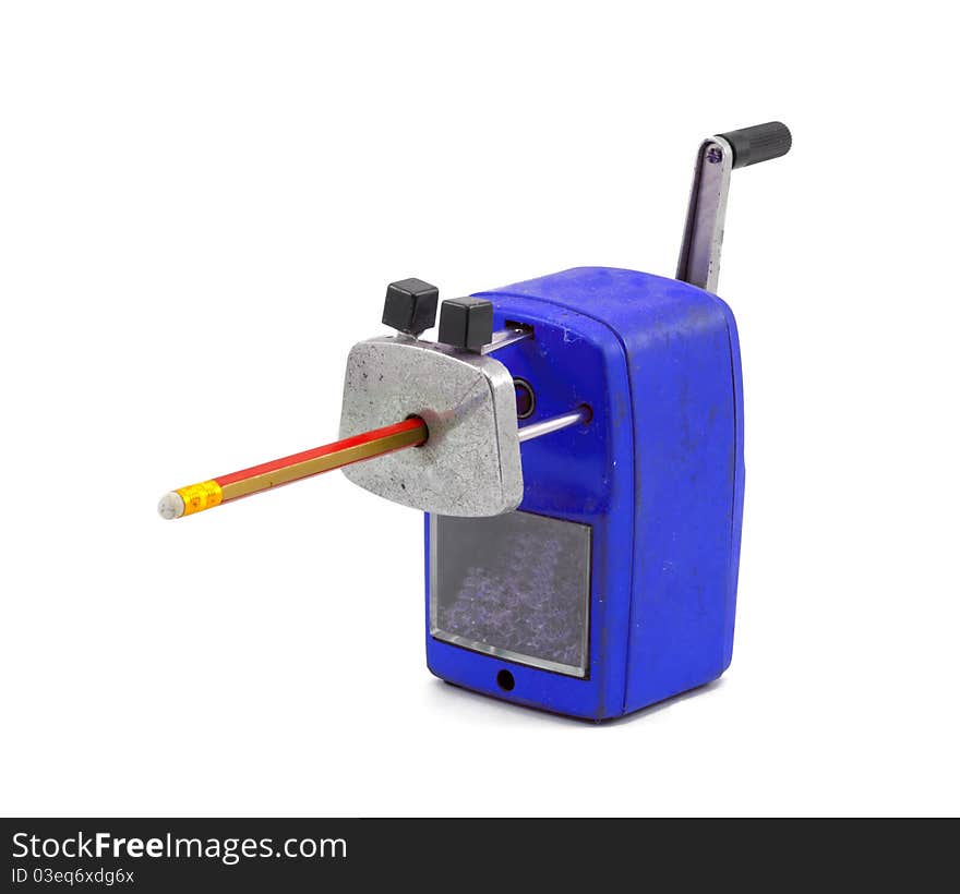 Mechanical sharpener of pencil on the white background