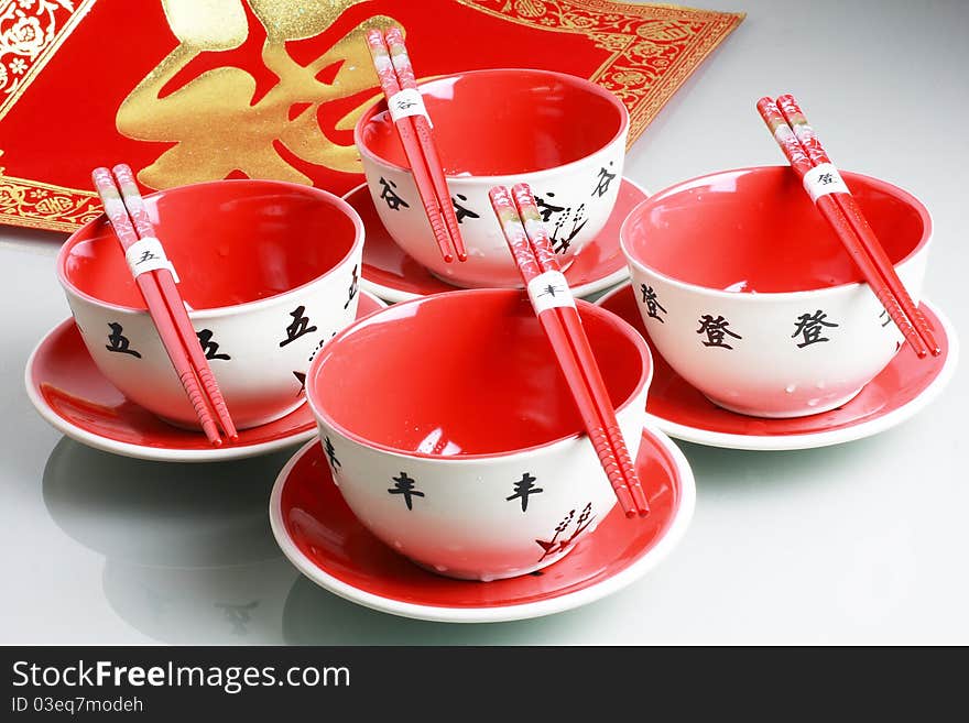 In Chinese new year,people always use red tableware to hope goodness for the future. In Chinese new year,people always use red tableware to hope goodness for the future