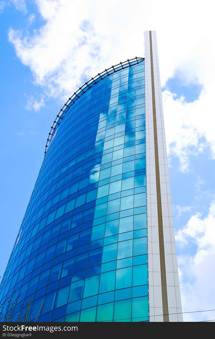 Skyscraper And Clouds