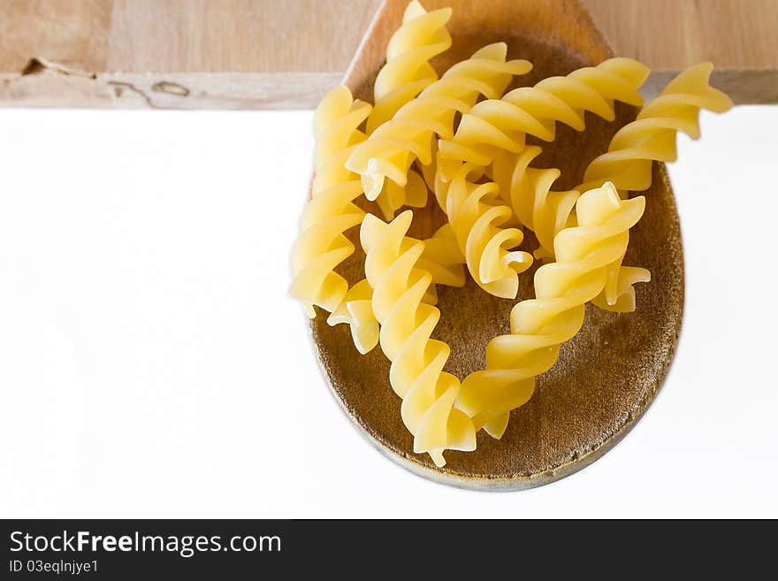 Fusilli on the wood spoon