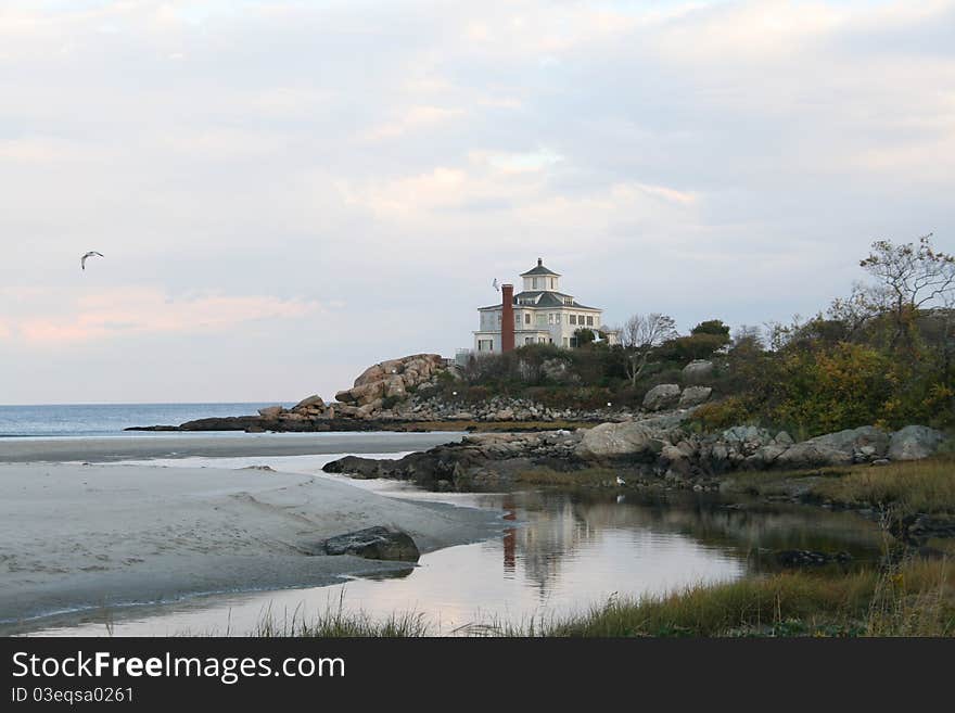 A shoreline along the coast of New England 
with the tide coming in is a typical and beautiful site. A shoreline along the coast of New England 
with the tide coming in is a typical and beautiful site.