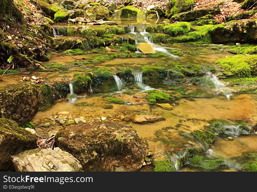 Cascade of the mountain river