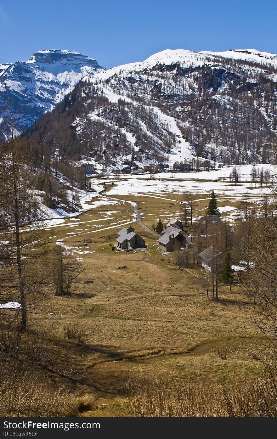 A little village in a mountain landscape. A little village in a mountain landscape