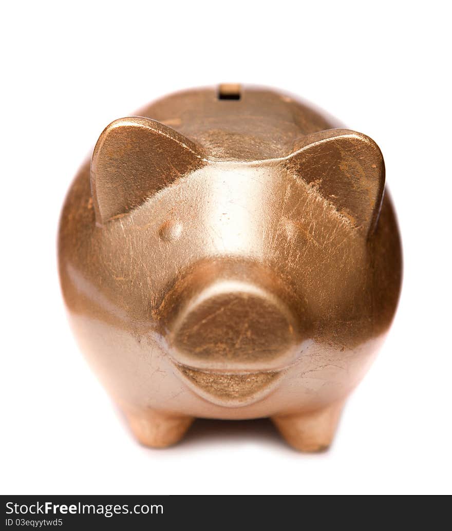 Golden happy pig moneybox at white background. Golden happy pig moneybox at white background