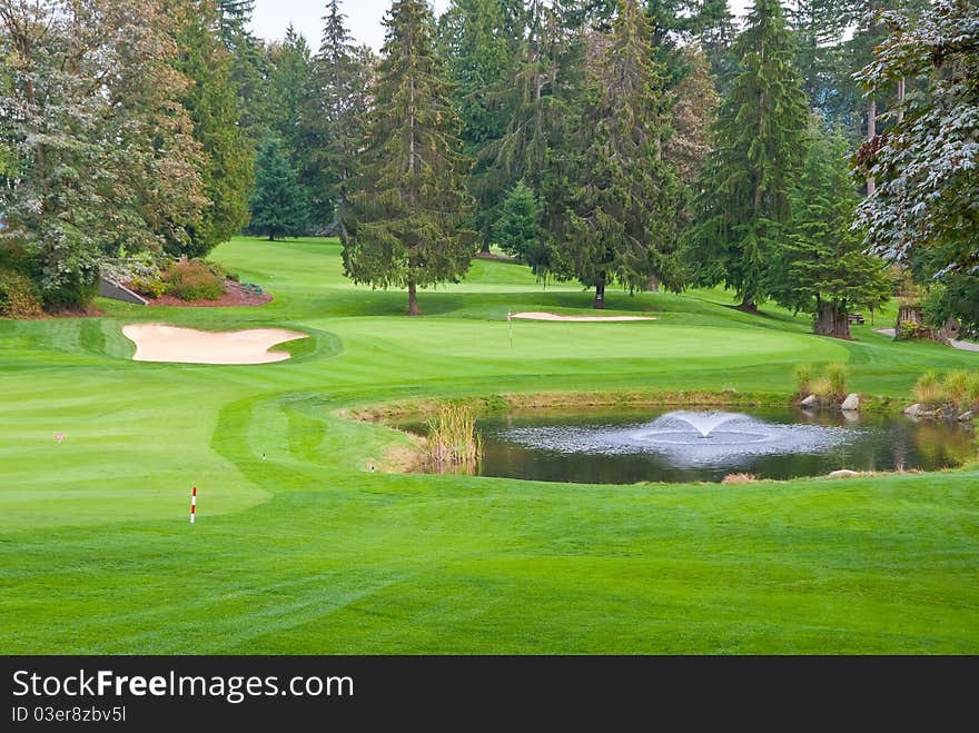 Golf place with gorgeous green and pond. Golf place with gorgeous green and pond.