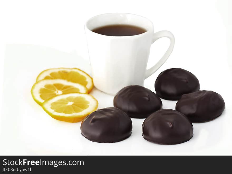 Chocolates, lemon and cup of tea. Chocolates, lemon and cup of tea