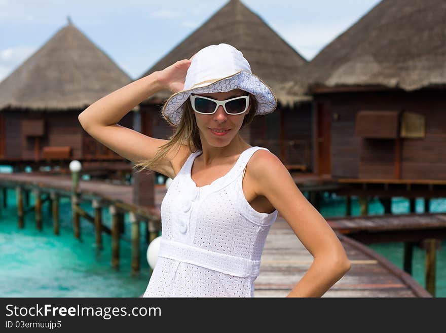 A girl on a pier