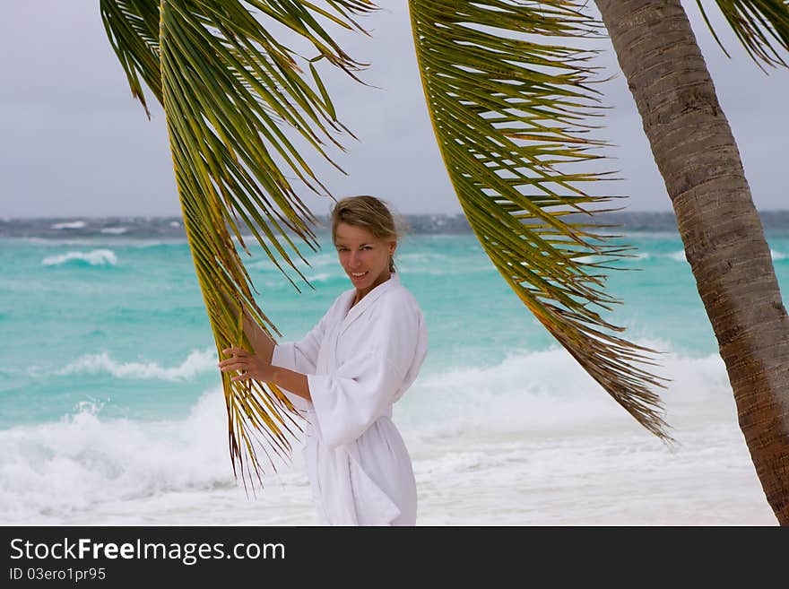 Young woman on a tropical beach