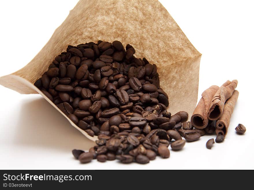 Coffee beans with cinnamon pole