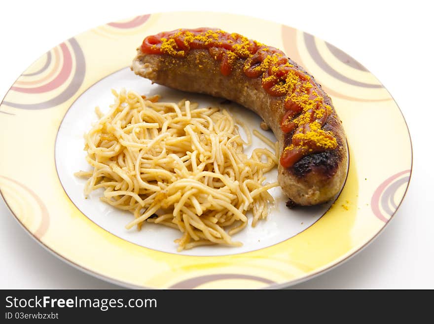 Curry sausage with noodles