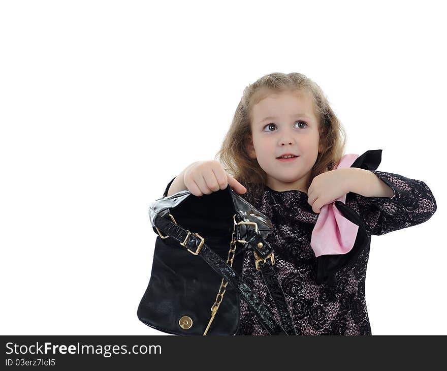 Pretty little child girl in black elegant party dress with empty bag. isolated. Pretty little child girl in black elegant party dress with empty bag. isolated