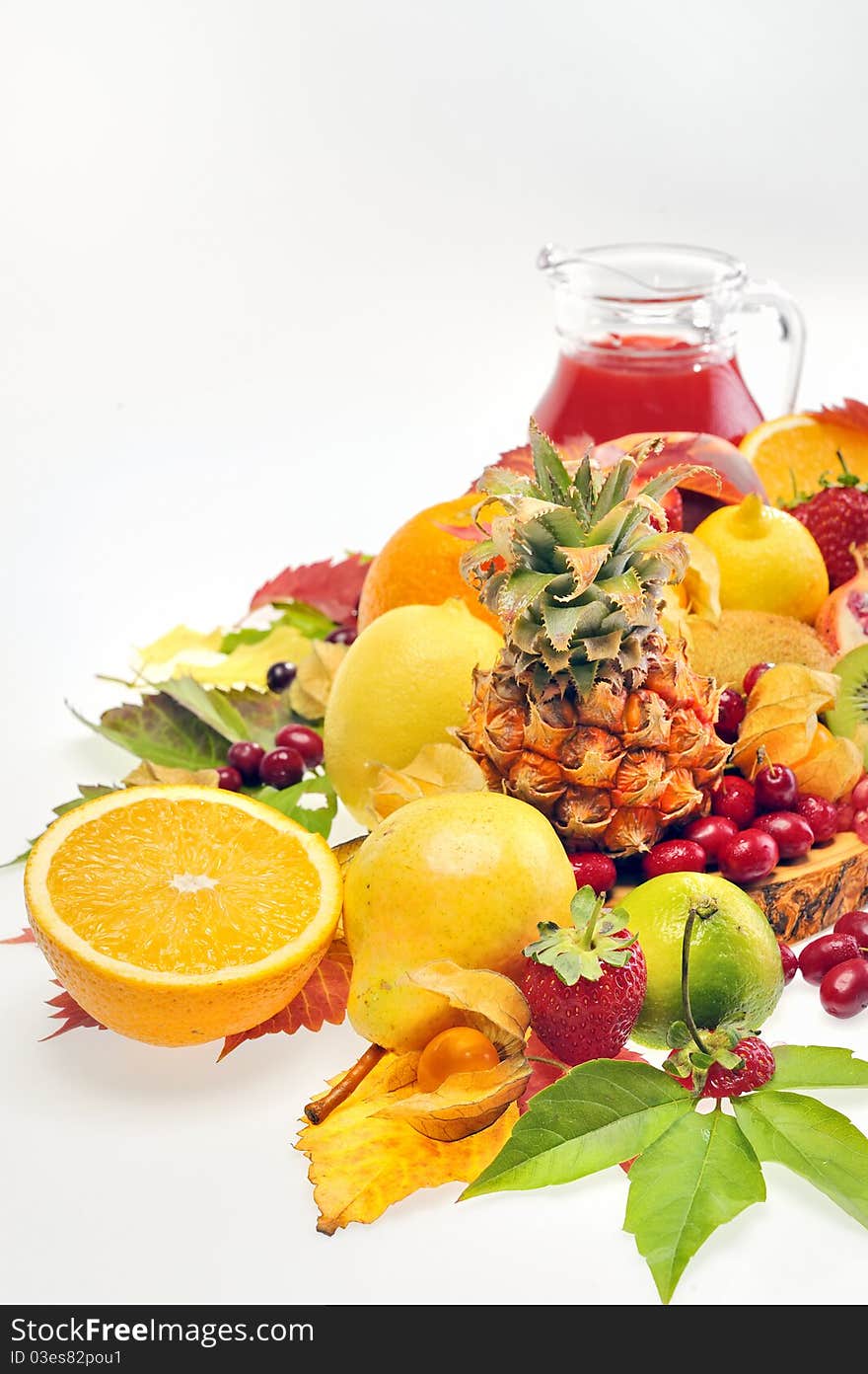 Various fruits and juice isolated on white