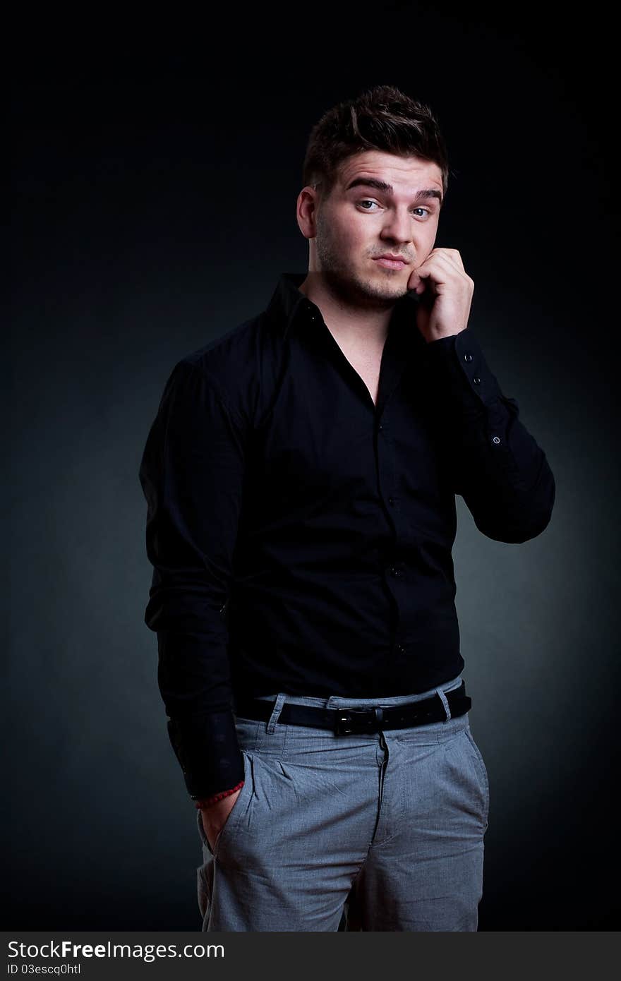 Young Man Posing And Looking At Camera