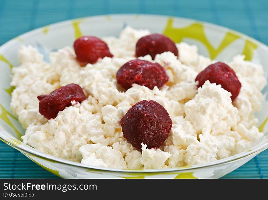 Fresh domestic milk cheese on a plate