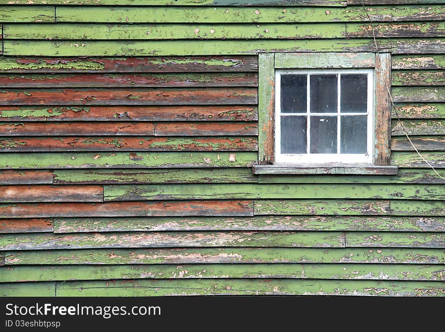 Old grunge green wooden panel with glass windows. Old grunge green wooden panel with glass windows