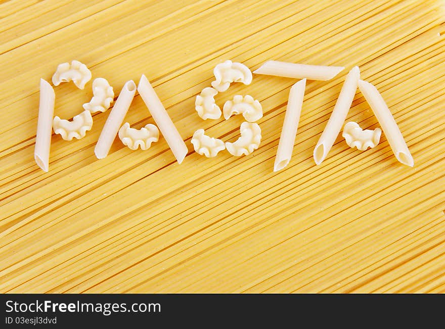 Different kinds of italian pasta and word Pasta