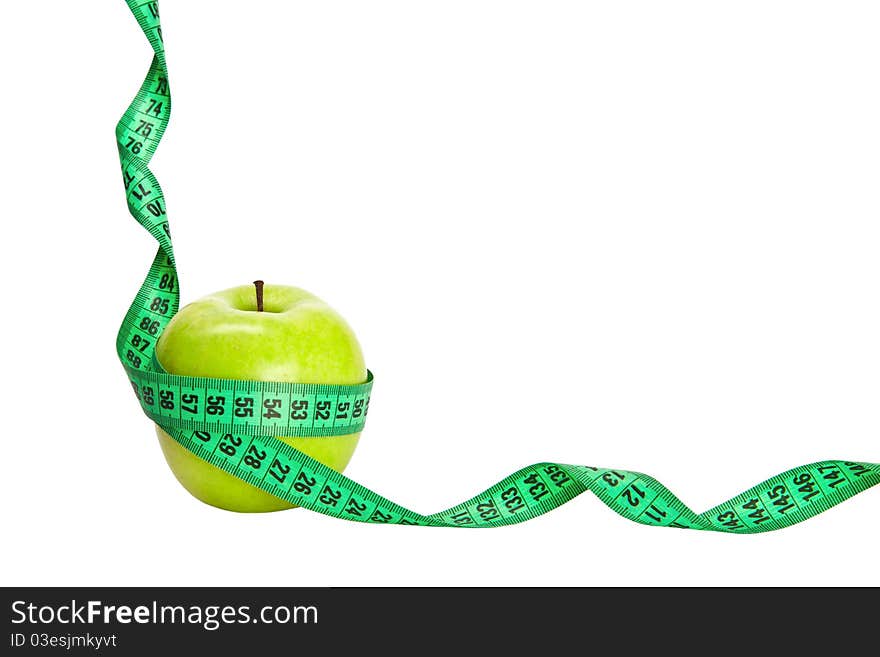 Green apple and a measuring tape isolated on white