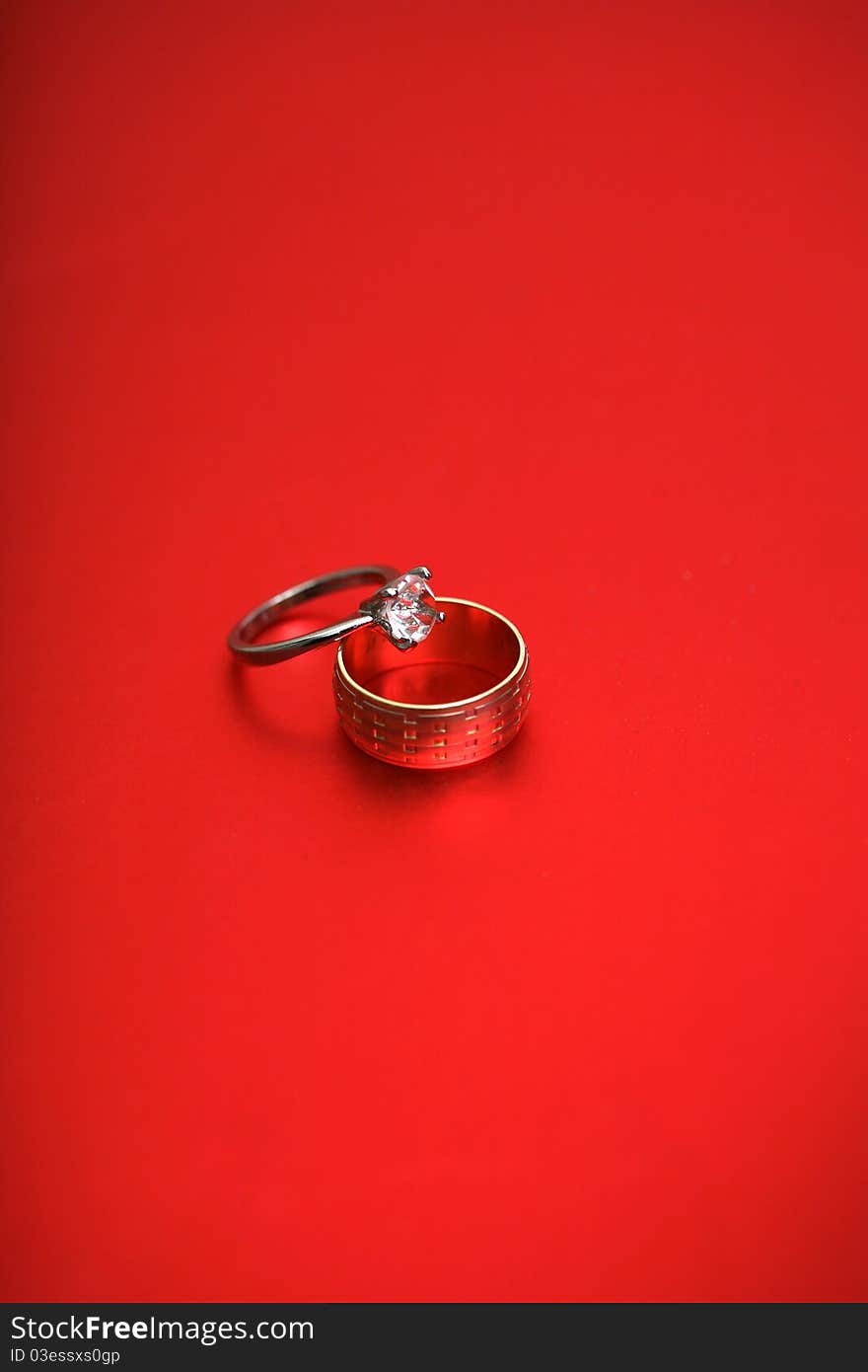 Wedding rings and red backgroun. Wedding rings and red backgroun