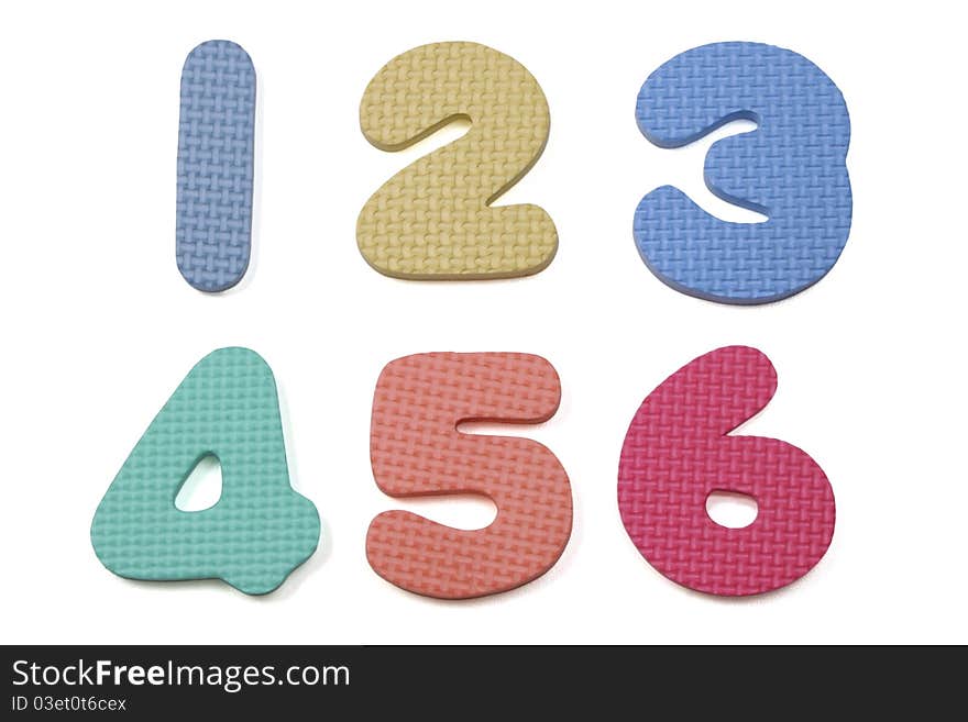 Colorful foam numbers one to six on a white background. Colorful foam numbers one to six on a white background