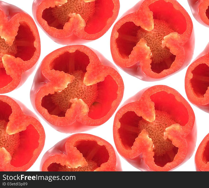 Background with sweet peppers on white