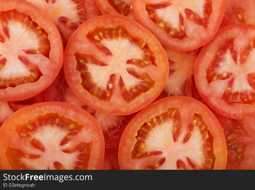 Background with pieces of tomatoes