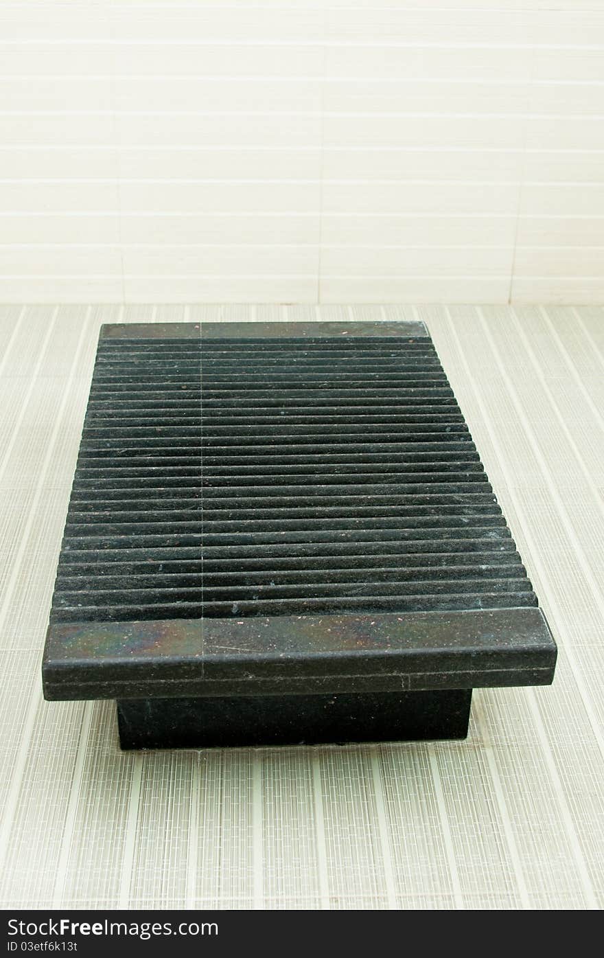 A traditional washboard made of marble