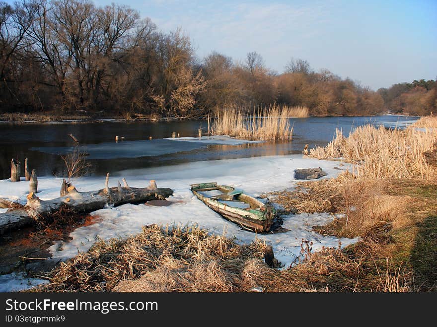 Landscape with old boat