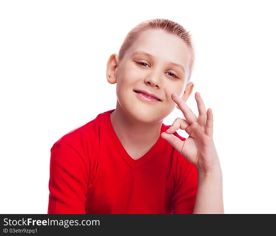 Happy ten year old boy showing the sign OK and smiling. Happy ten year old boy showing the sign OK and smiling