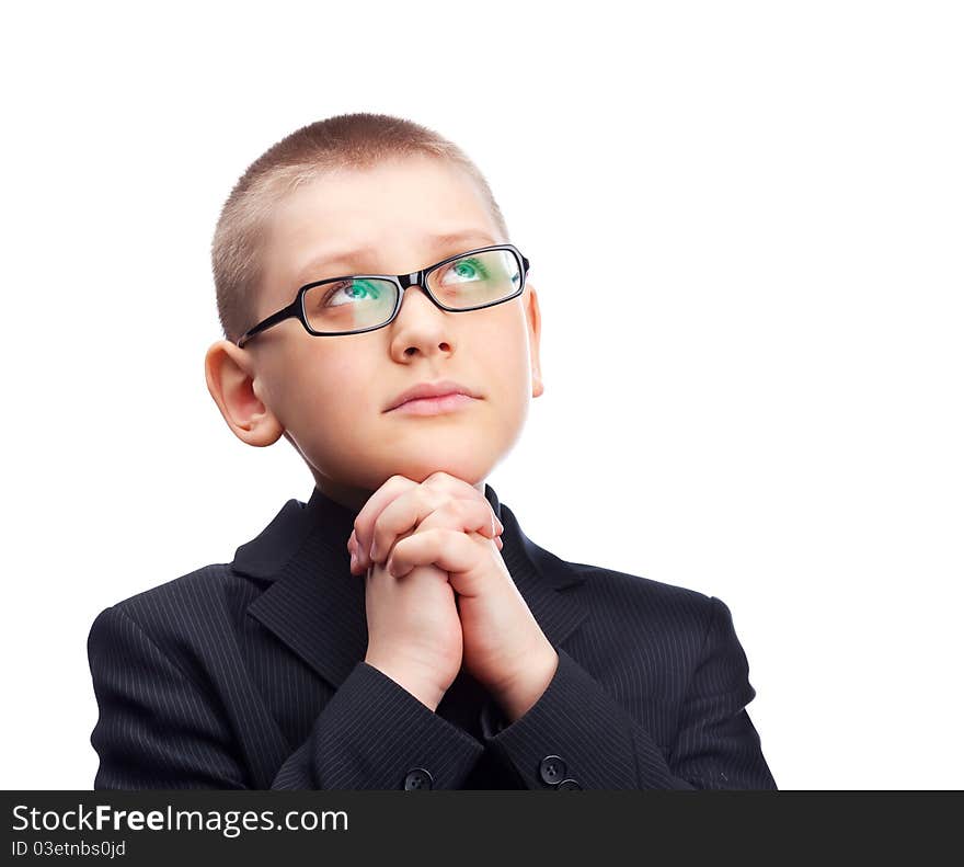 Ten year old blond boy wearing a costume, isolated against white. Ten year old blond boy wearing a costume, isolated against white