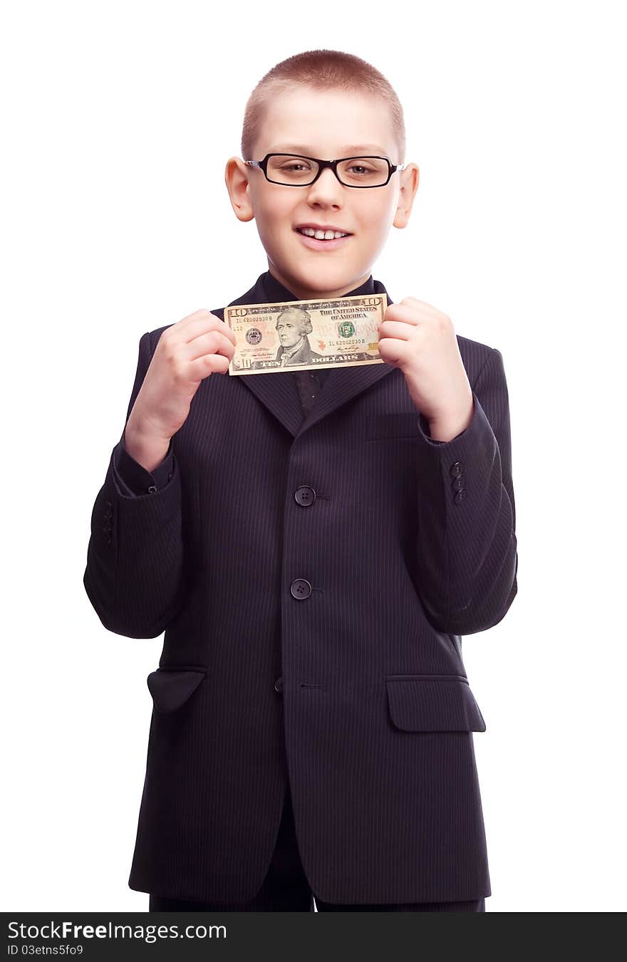 Ten year old blond boy wearing a costume with ten dollars in his hands. Ten year old blond boy wearing a costume with ten dollars in his hands