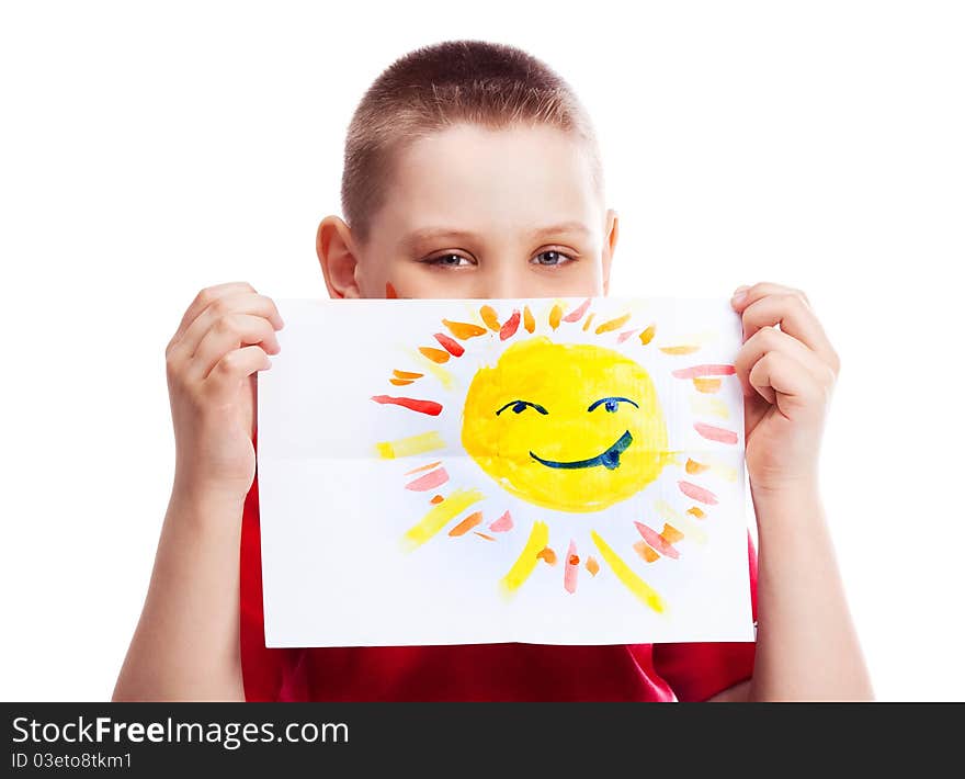 Cute ten year old boy with a watercolor picture of the sun. Cute ten year old boy with a watercolor picture of the sun