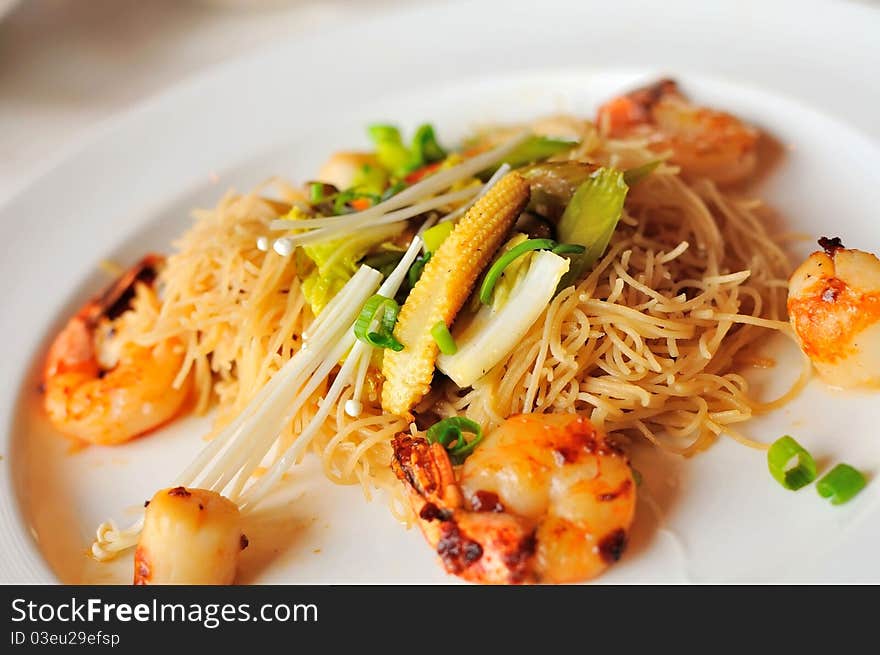 Special Chinese style seafood noodles also known as bee hoon. Special Chinese style seafood noodles also known as bee hoon.