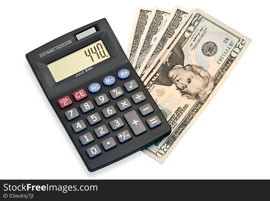 Calculator and dollars isolated on a white background. Calculator and dollars isolated on a white background