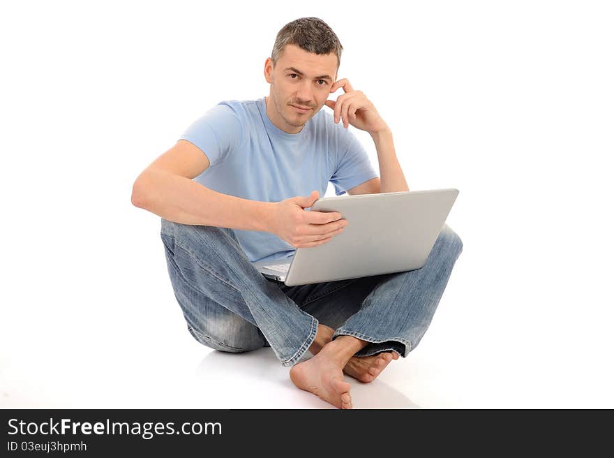 Young Male Working On Laptop Computer