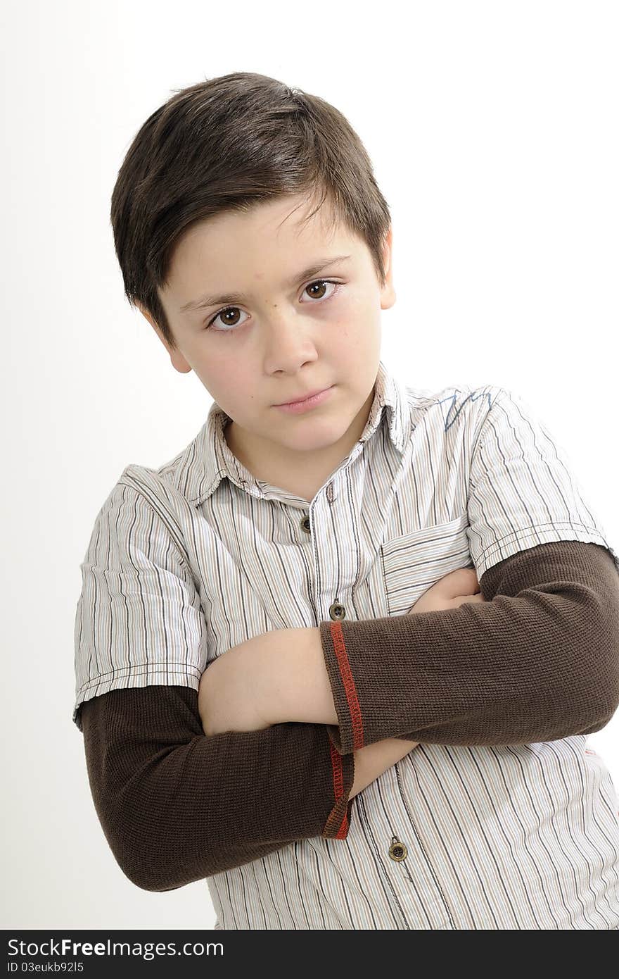 Cute school boy posing in studio. Cute school boy posing in studio