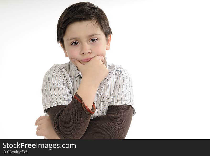 Cute school boy posing in studio. Cute school boy posing in studio