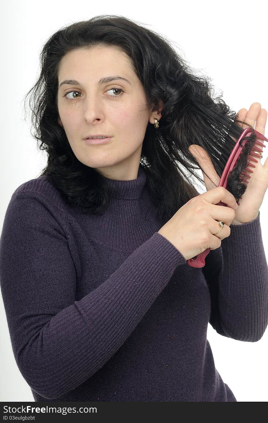 Nervous Female Brushing Hair