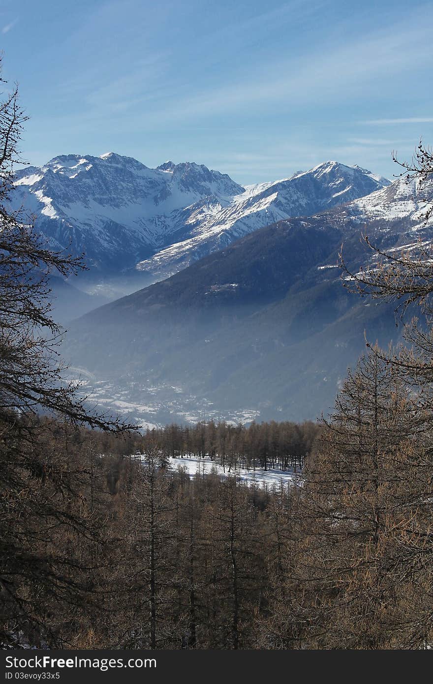 Haze in the mountain vale(vertical) in Italy