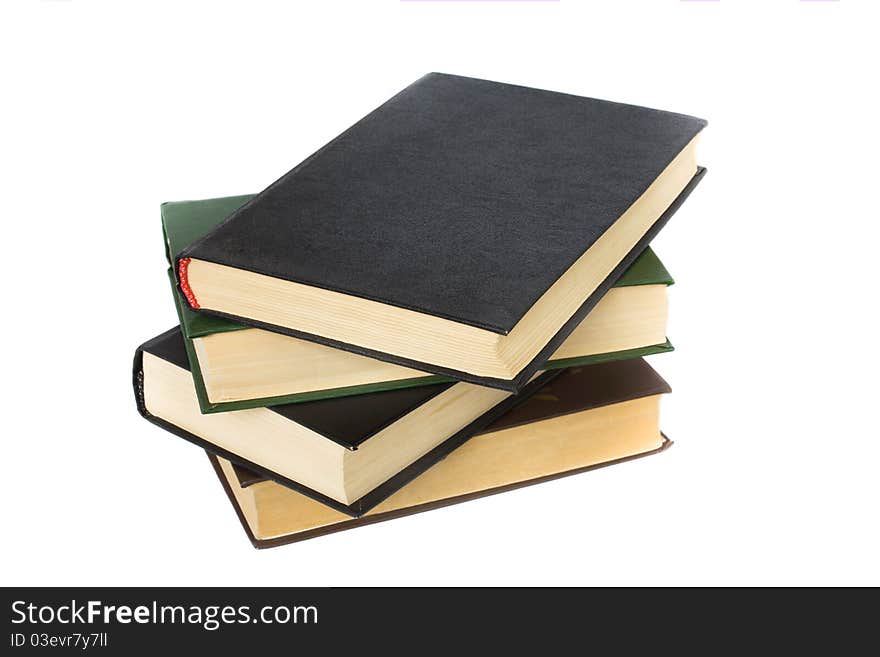 Group of old books on white background