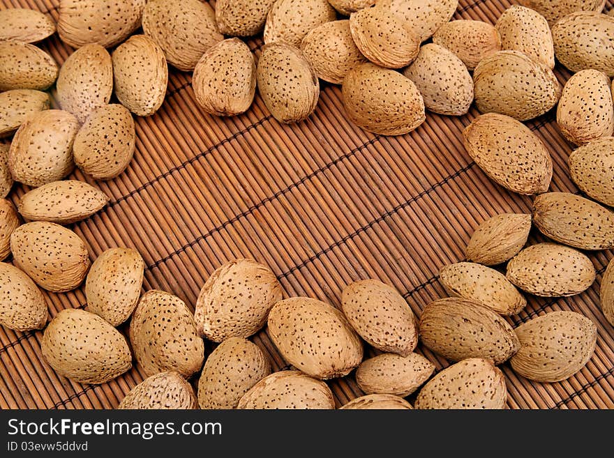 Almond nuts background with space for notes