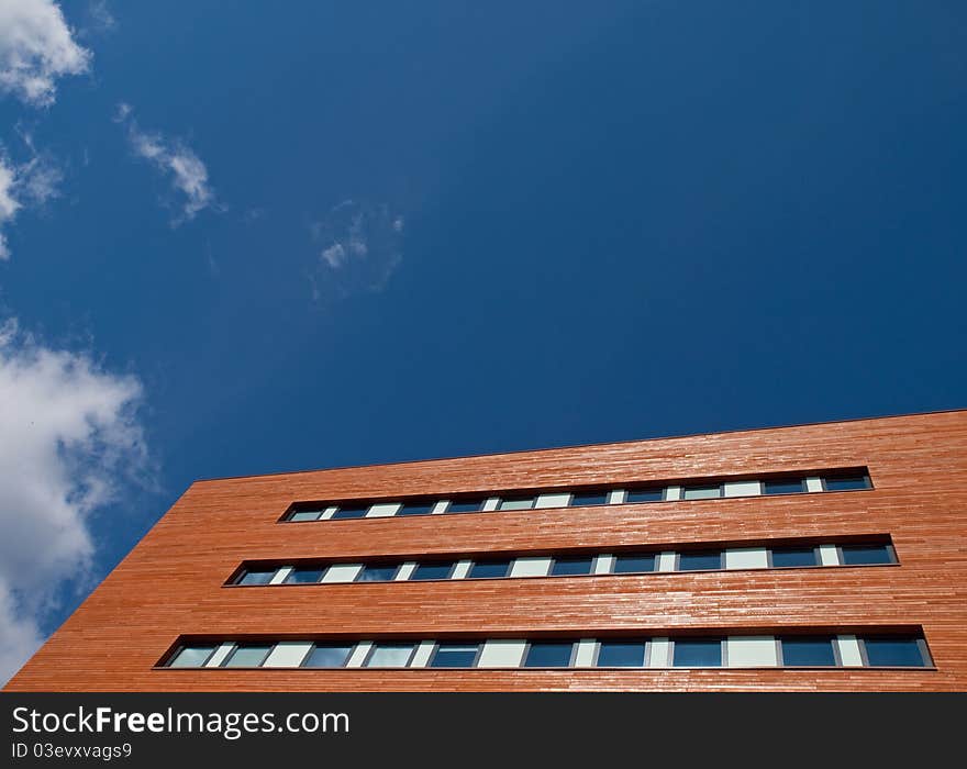 An office with a timber facade in the modern office park organized Beukenhorst South in Hoofddorp, Netherlands. An office with a timber facade in the modern office park organized Beukenhorst South in Hoofddorp, Netherlands.