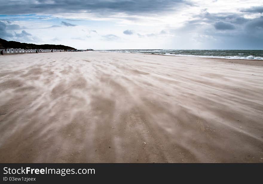 Sand drifting across beach