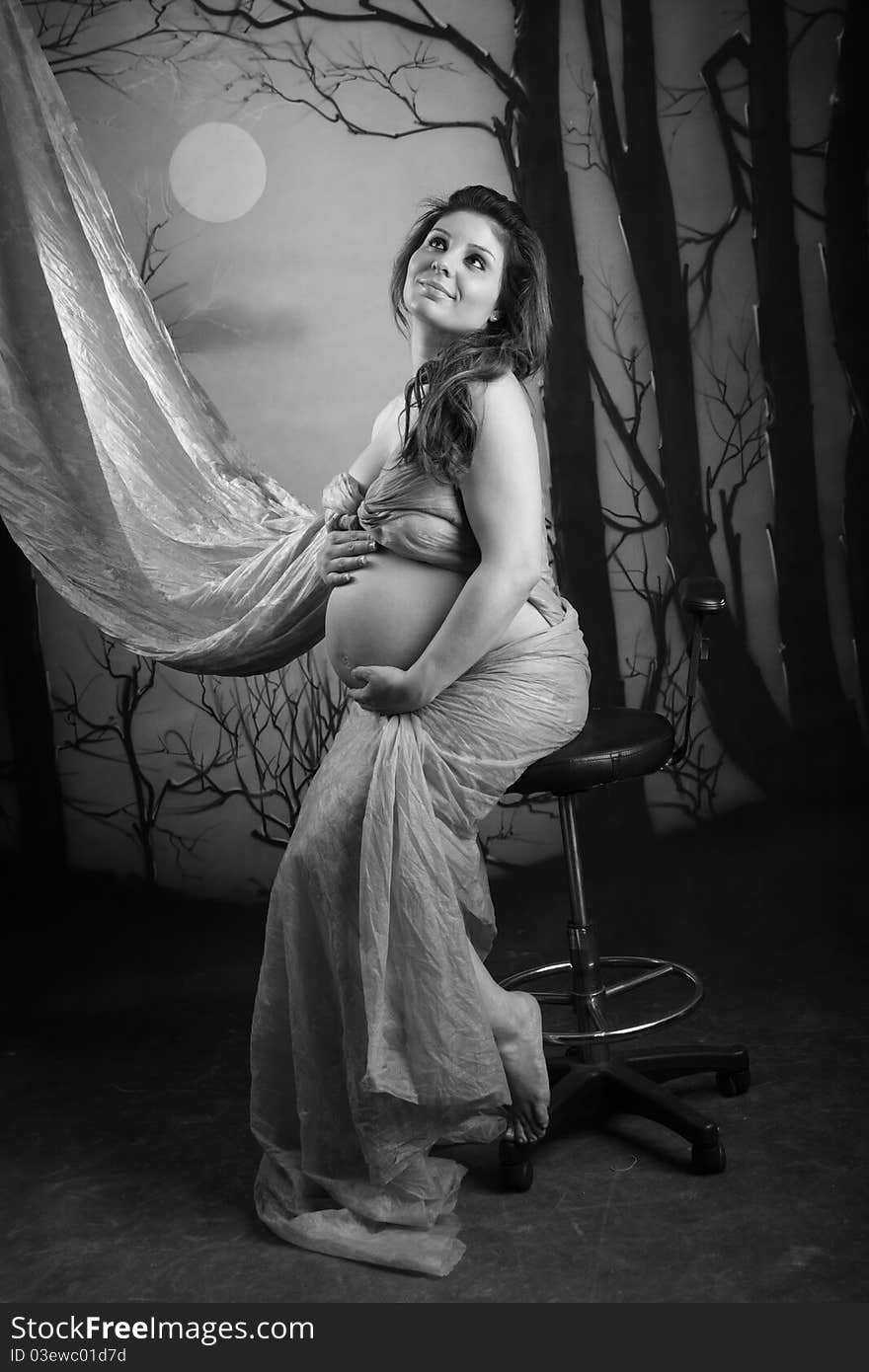 Portrait Of A Pregnant Woman On Black And White