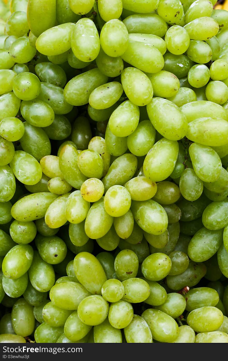 Fresh grape fruits with green leaves. Fresh grape fruits with green leaves